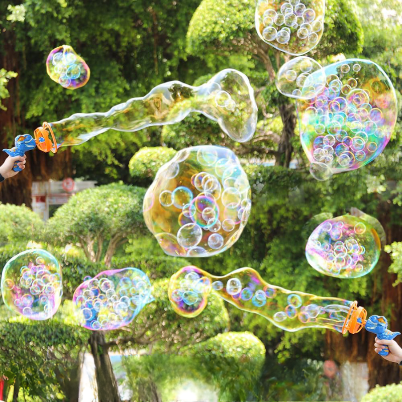 Pistola de Burbujas Dino para Niños